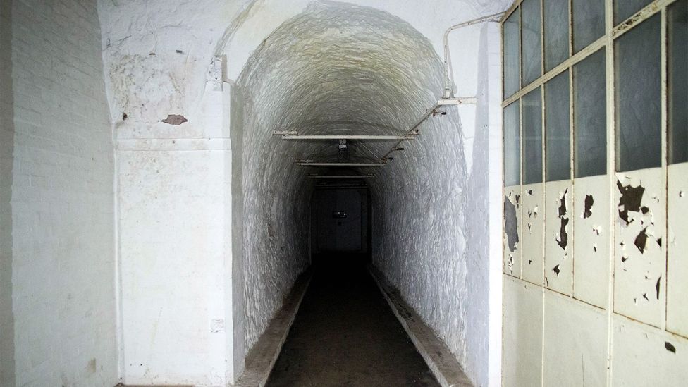 A tunnel leading from the RSG offices to a bricked-up wall; behind here, the rest of the factory lies empty (Credit: William Park) A tunnel leading from the RSG offices to a bricked-up wall; behind here, the rest of the factory lies empty (Credit: William Park)
