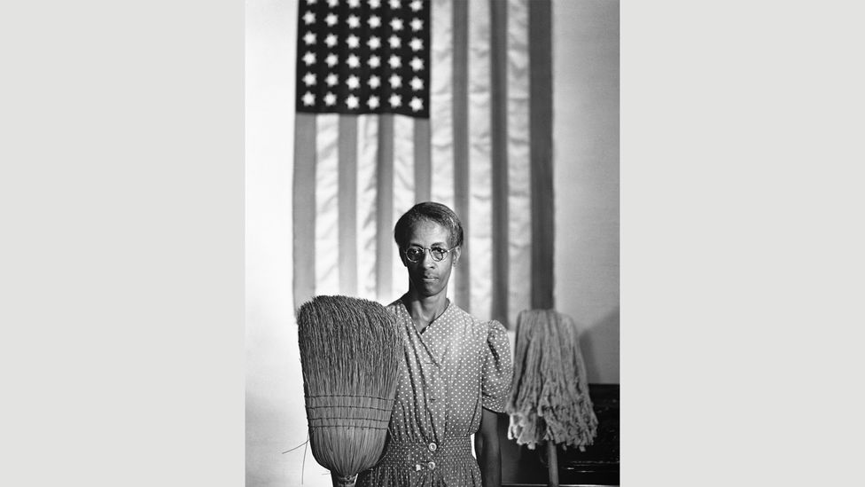 Gordon Parks' 1942 photograph of Ella Watson riffs on American Gothic for a serious rather than comic effect (Credit: Getty Images)