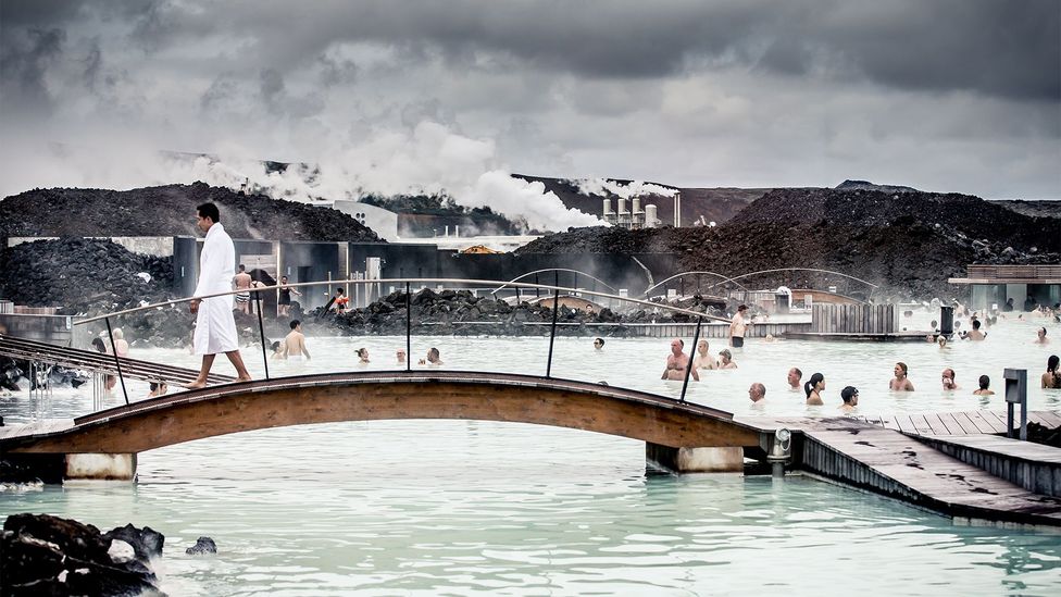 The Blue Lagoon has long been one if Iceland's most popular attractions. The artificial pool is warmed by a nearby geothermal power plant (Credit: Getty Images)