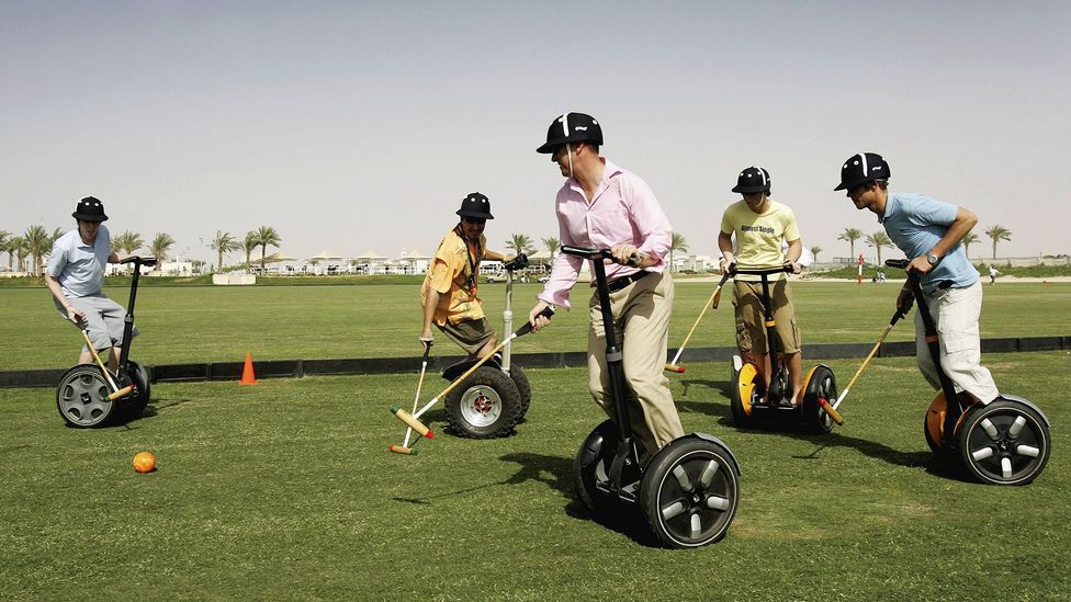 Expats play polo on Segways in Dubai (Credit: Getty Images) Expats play polo on Segways in Dubai (Credit: Getty Images)