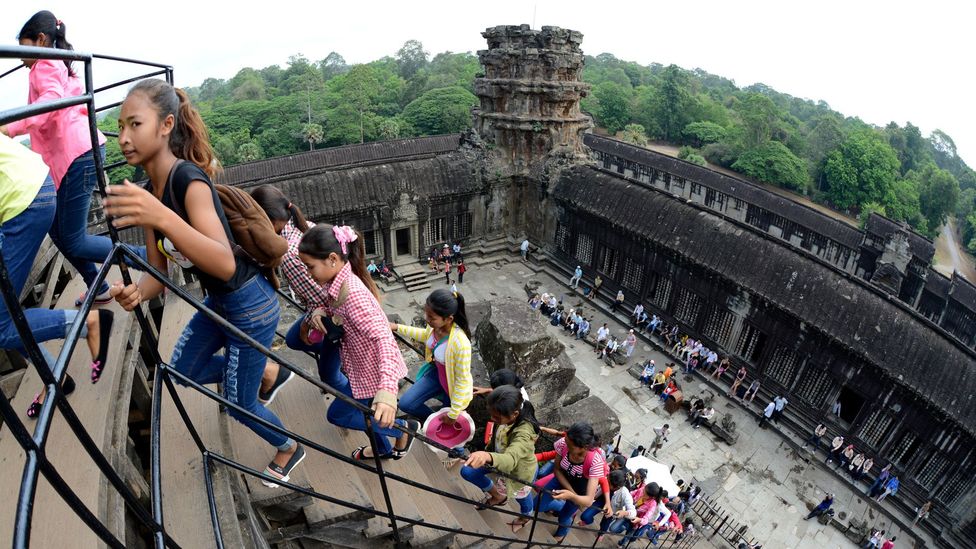Because of the Khmer Rouge presence nearby through the '90s only a few thousand people would visit Angkor Wat a year at that time – millions now visit annually (Credit: Alamy) Because of the Khmer Rouge presence nearby through the '90s only a few thousand people would visit Angkor Wat a year at that time – millions now visit annually (Credit: Alamy)