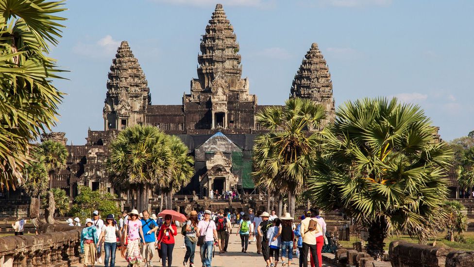 Angkor Wat is the largest religious complex in the world, covering a space of 500 acres (2 sq km) – it was initially built as a Hindu temple to honour Vishnu (Credit: Alamy) Angkor Wat is the largest religious complex in the world, covering a space of 500 acres (2 sq km) – it was initially built as a Hindu temple to honour Vishnu (Credit: Alamy)