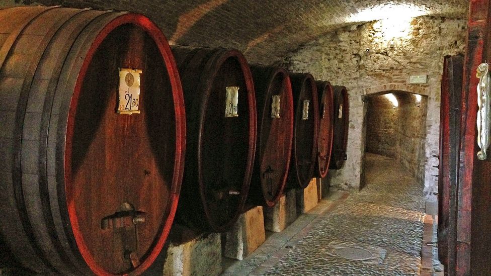 The passageway between the inn and Machiavelli’s home is lined with ceiling-high barrels (Credit: Silvia Marchetti)