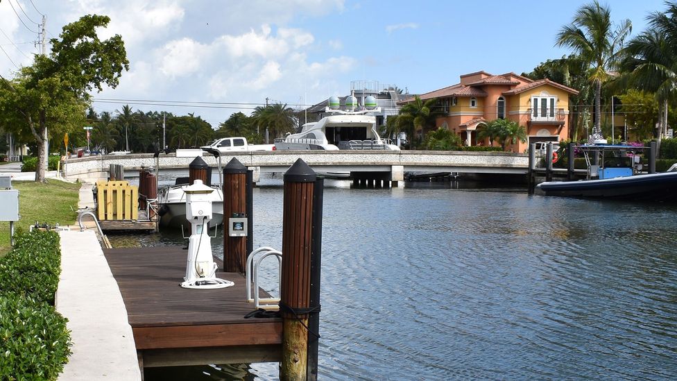 With its varying seawall heights, new decks and bridge, this corner of Fort Lauderdale shows the domino effect of changing one piece of infrastructure (Credit: Amanda Ruggeri)