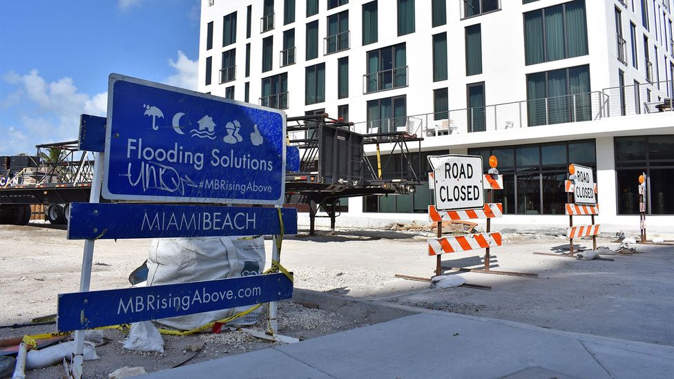 Signs like these have become ubiquitous in Miami Beach, where officials are determined to fight flooding and have launched a multi-pronged plan (Credit: Amanda Ruggeri)