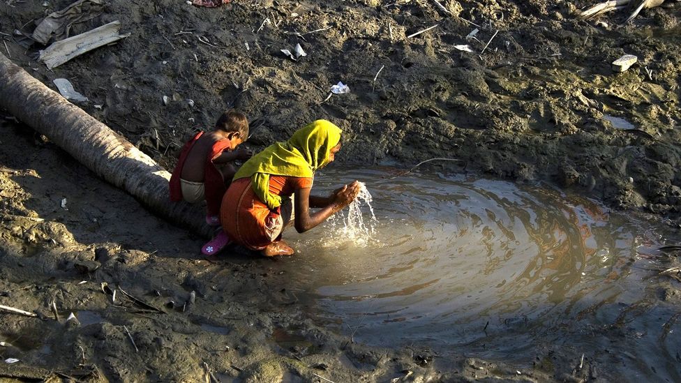 Readily available freshwater supplies are especially crucial following natural disasters, as seen here in Bangladesh, following Cyclone Sidr in 2008 (Credit: Getty Images)