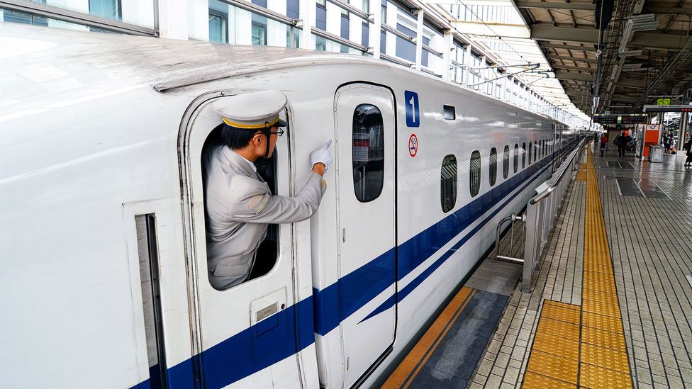 Japanese train conductors practice shisa kanko, pointing at what they need to check and then naming it out loud (Credit: Trevor Mogg/Alamy)