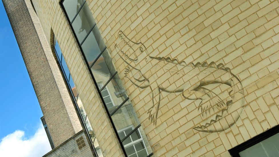 Part of the Arts and Crafts movement, Gill became quite experimental – such as carving this outline of a crocodile into the Mond Laboratory's wall at Cambridge (Credit: Alamy)