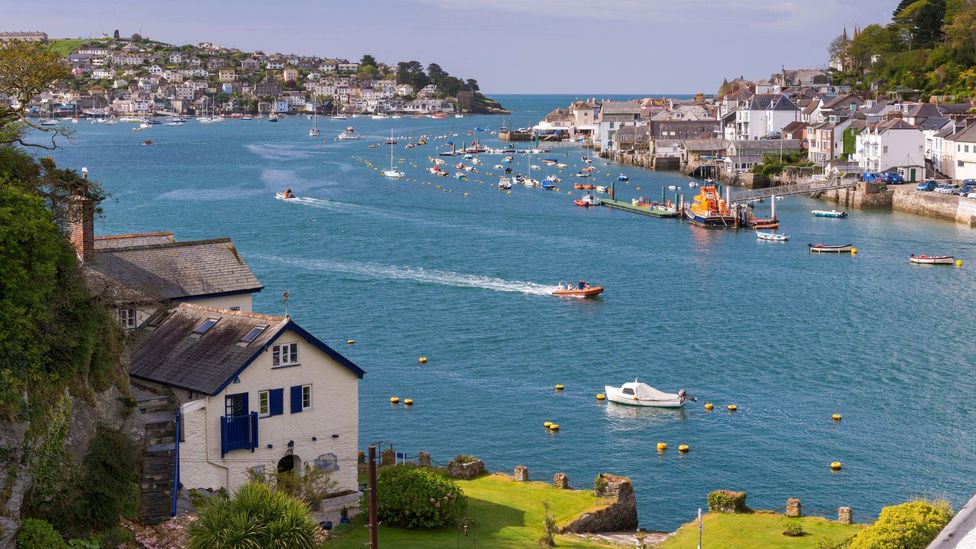 Du Maurier’s family home Ferryside, on the left, was in the Cornwall village of Bodinnick, right on the Fowey Estuary – the setting of many of her stories (Credit: Alamy) Du Maurier’s family home Ferryside, on the left, was in the Cornwall village of Bodinnick, right on the Fowey Estuary – the setting of many of her stories (Credit: Alamy)