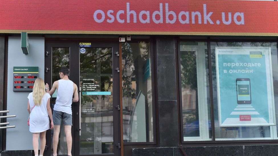 Oschadbank, one of the largest banks in Ukraine, was forced to shut its branches (Credit: Sergei Supinsky/AFP/Getty Images) Oschadbank, one of the largest banks in Ukraine, was forced to shut its branches (Credit: Sergei Supinsky/AFP/Getty Images)