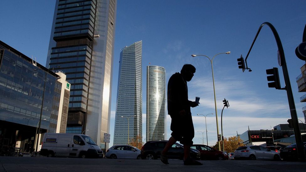 A man begs for food outside a financial district in Madrid (Credit: Getty Images) A man begs for food outside a financial district in Madrid (Credit: Getty Images)