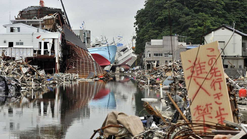 During the 2011 earthquake in Japan, people ran to save bottles of alcohol from smashing in supermarkets while their lives were in danger (Credit: Getty Images)