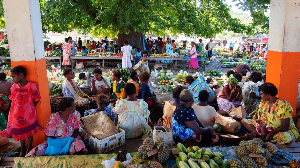 Upon trying to communicate at the Lenakel Market, the author discovered Bislama was not an easy language to understand (Credit: Whitworth Images/Getty Images)