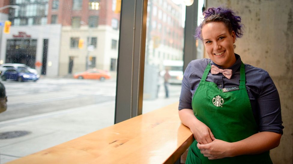 Starbucks relaxed their already laid-back dress policy and now encourages workers to sport hats and coloured hair (Credit: Getty Images)
