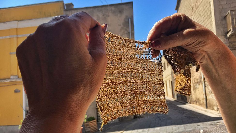 When held into the light, sea silk transforms from a brownish colour into a golden hue (Credit: Eliot Stein)