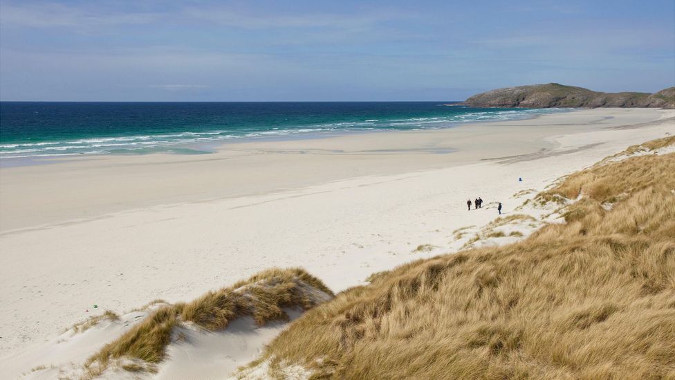 Outer Hebridean islands like the Isle of Barra may be beautiful – but they are also home to some of the UK’s happiest people (Credit: Alamy)