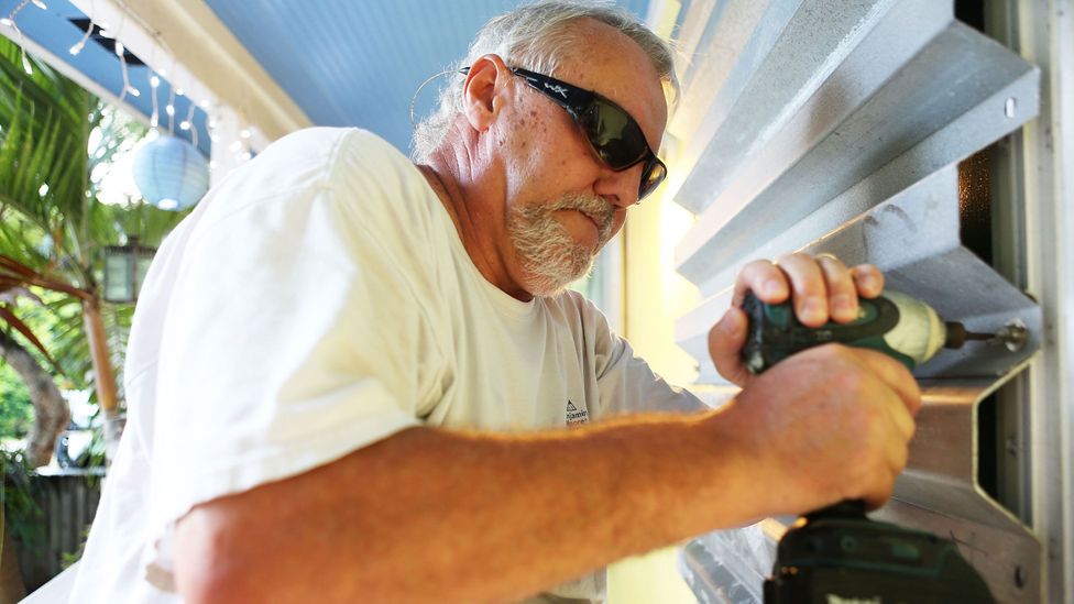 Resident Gordon Forget installs hurricane shutters in Islamorada, Florida on 6 September 2017 (Credit: Marc Serota/Getty Images) Resident Gordon Forget installs hurricane shutters in Islamorada, Florida on 6 September 2017 (Credit: Marc Serota/Getty Images)