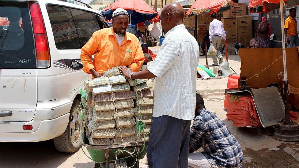 In Somaliland, stacks and stacks of the local devalued physical currency are rapidly falling out of fashion - people are turning to digital payments (Credit: Matthew Vickery) In Somaliland, stacks and stacks of the local devalued physical currency are rapidly falling out of fashion - people are turning to digital payments (Credit: Matthew Vickery)