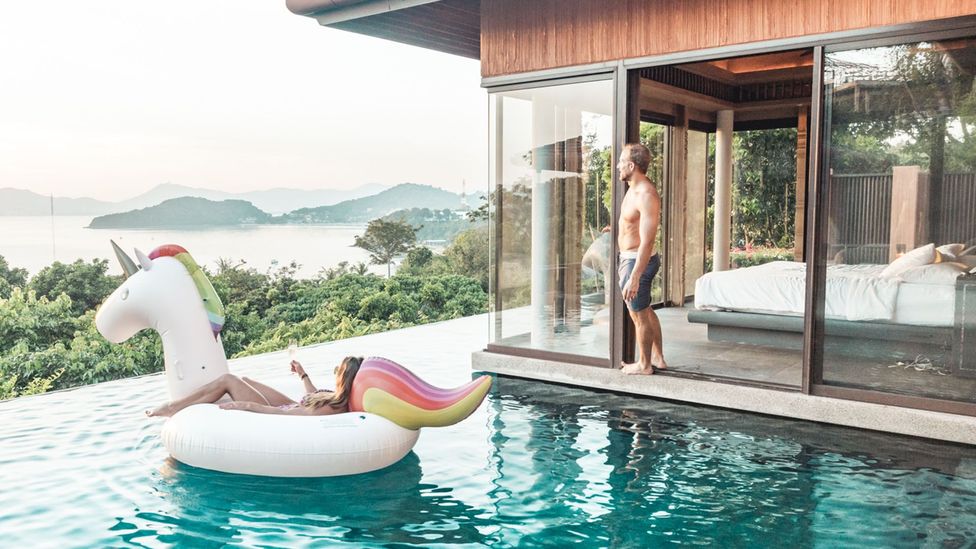 Collette and Scott Stohler watching the sunset over the Andaman Sea in Phuket, Thailand (Credit: Scott Stohler)