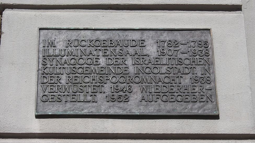 A small plaque outside Weishaupt’s former home marks the building as an old Illuminati meeting place (Credit: Julie Ovgaard)