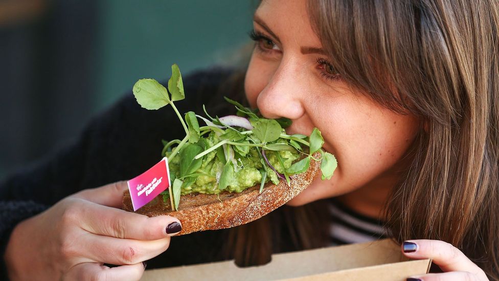 A millennial, apparently one slice of avocado toast further away from home ownership (Credit: Getty Images) A millennial, apparently one slice of avocado toast further away from home ownership (Credit: Getty Images)