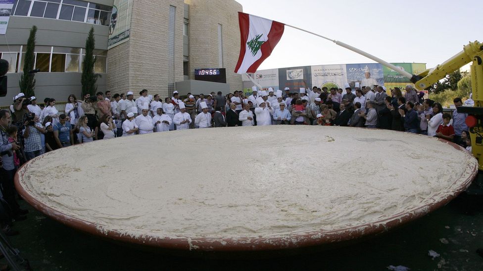 Lebanon holds the Guinness Book of World Records for largest plate of hummus, weighing 10,452kg (Credit: Anwar Amro/Getty Images)