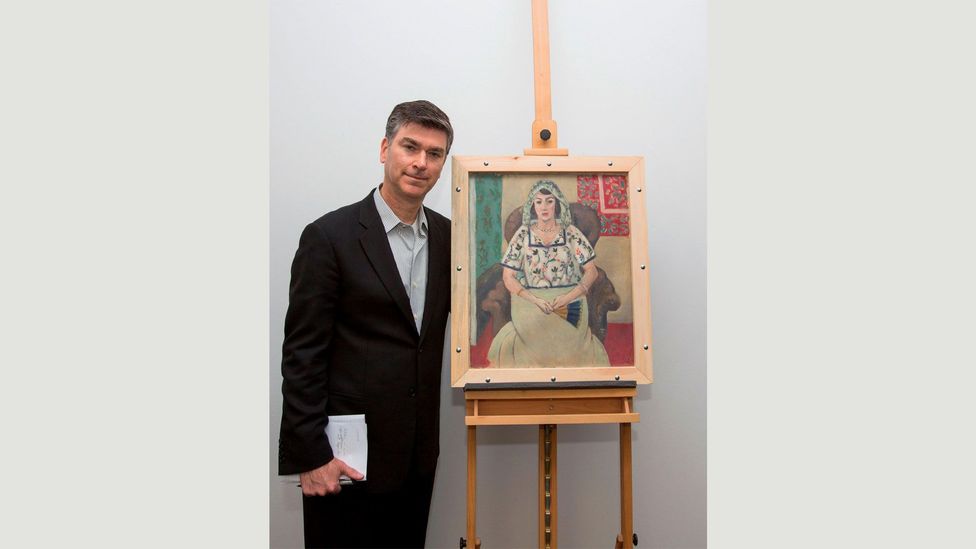 One of the most significant finds was Seated Woman by Matisse – owned by the Jewish art dealer Paul Rosenberg – seen here with a Rosenberg representative (Credit: Alamy)