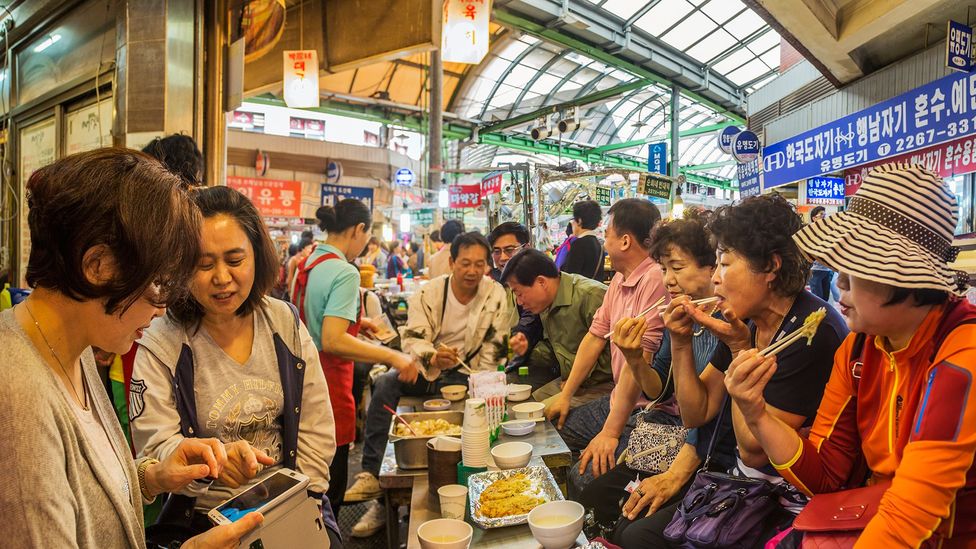 Koreans approach everyday events like ordering food to riding public transport with the group in mind (Credit: Atlantide Phototravel/Getty Images)