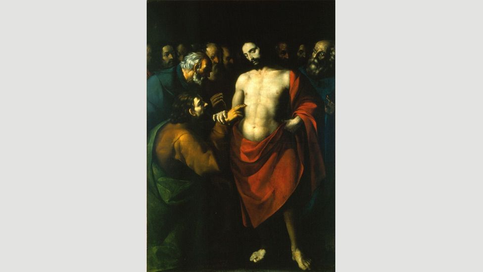 In López de Arteaga’s undated work The Incredulity of Saint Thomas, the red smock worn by Christ, denoting his holiness, pops off the canvas (Credit: Wikimedia)