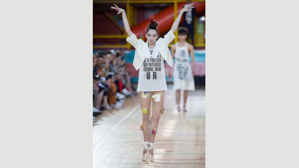 The latest collection from Westwood emblazons slogans on T-shirts – and aprons (Credit: Alamy) The latest collection from Westwood emblazons slogans on T-shirts – and aprons (Credit: Alamy)