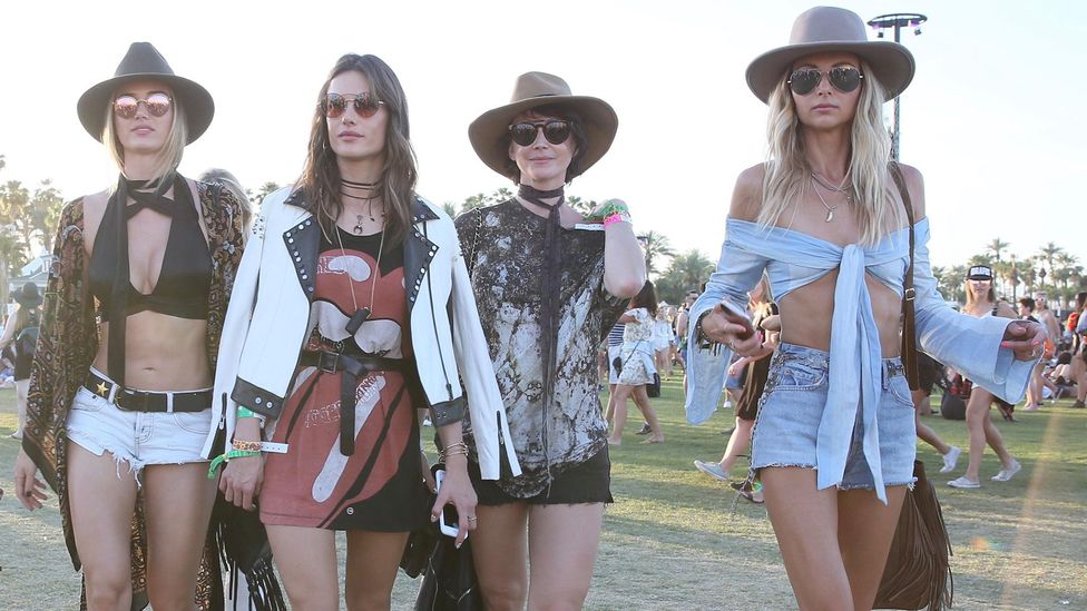 Festival-goers today still like to wear their musical tastes on their T-shirts (Credit: Alamy) Festival-goers today still like to wear their musical tastes on their T-shirts (Credit: Alamy)