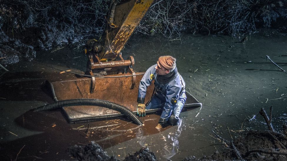 The ground around the tanks has to be drained before they can be lifted out (Credit: Denis Aldokhin) The ground around the tanks has to be drained before they can be lifted out (Credit: Denis Aldokhin)
