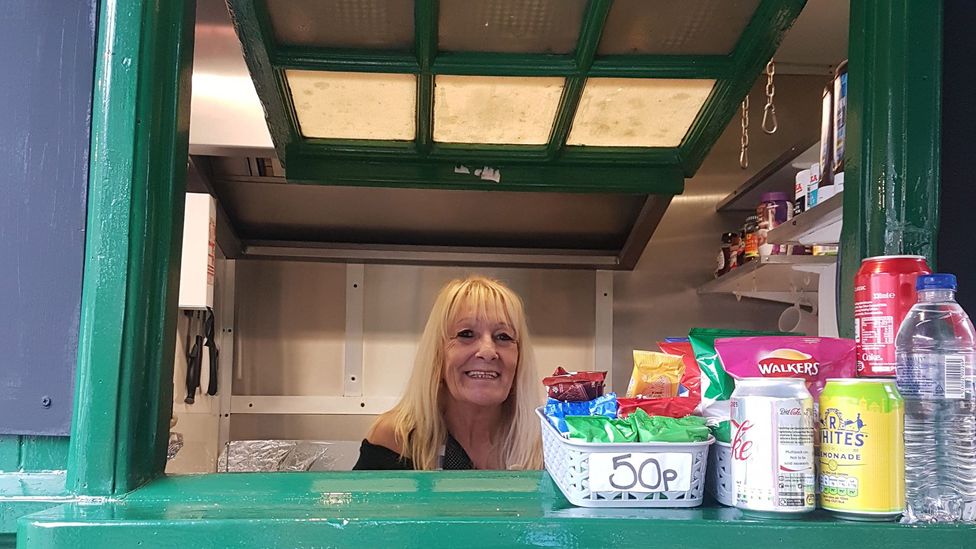 Jude Holmes also sells snacks to the public through the hatch of the Russell Square shelter (Credit: Ella Buchan)