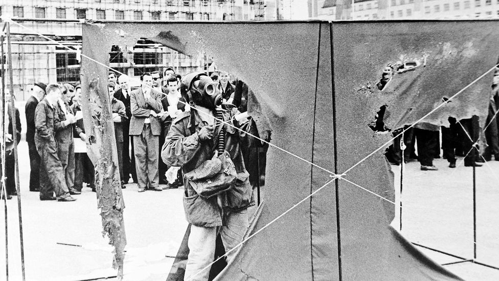 Gustav Metzger created his Auto-Destructive Art by spraying hydrochloric acid on sheets of nylon then standing by as they dissolved over 20 minutes (Credit: Getty Images) Gustav Metzger created his Auto-Destructive Art by spraying hydrochloric acid on sheets of nylon then standing by as they dissolved over 20 minutes (Credit: Getty Images)