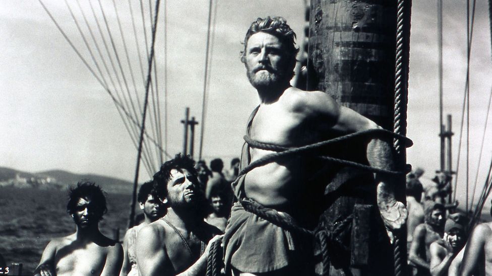 Kirk Douglas played Ulysses in the 1954 film based on Homer’s epic – in this scene, he listens to the song of the Sirens while strapped to a ship’s mast (Credit: Alamy)
