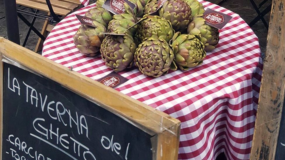 Restaurants in Rome’s Il Ghetto neighbourhood proudly display fresh artichokes during the spring (Credit: Irene Pirca)