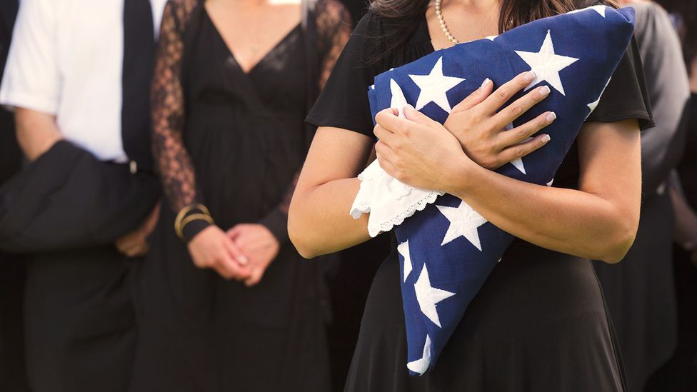 Thoughts of death can lead us to become more patriotic, while also hardening our sympathies to outsiders (Credit: Getty Images)