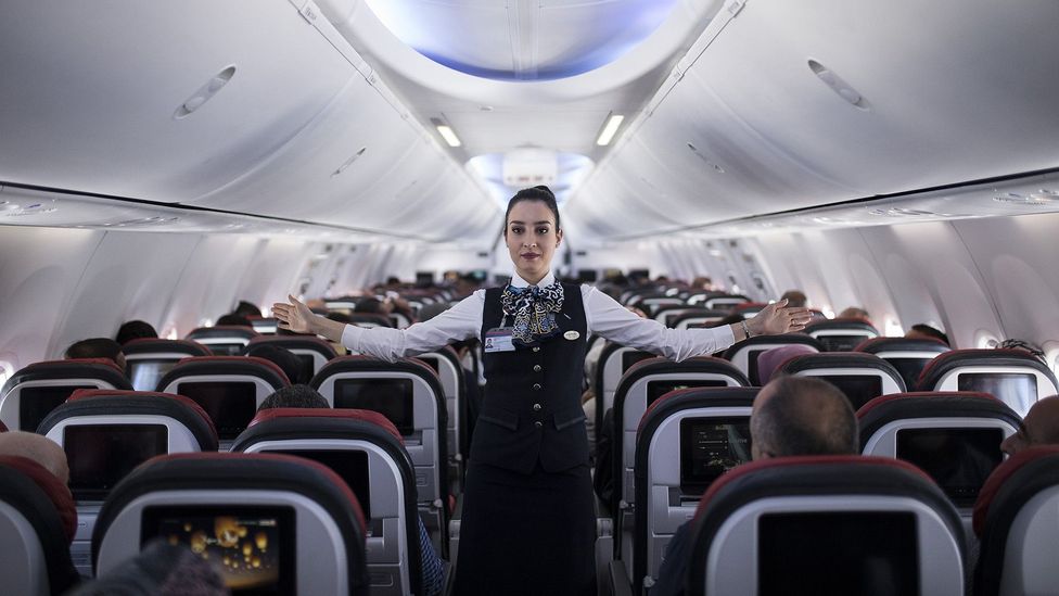 Cabin crew have to maintain an air of friendliness even when faced with abusive or combative passenger behaviour (Credit: Getty Images)
