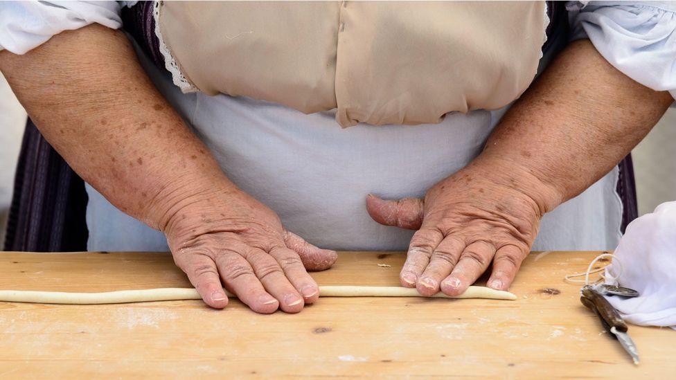 The women of Morgongiori make lorighittas by hand the way they have for hundreds of years (Credit: Patrizio Martorana/Alamy) The women of Morgongiori make lorighittas by hand the way they have for hundreds of years (Credit: Patrizio Martorana/Alamy)