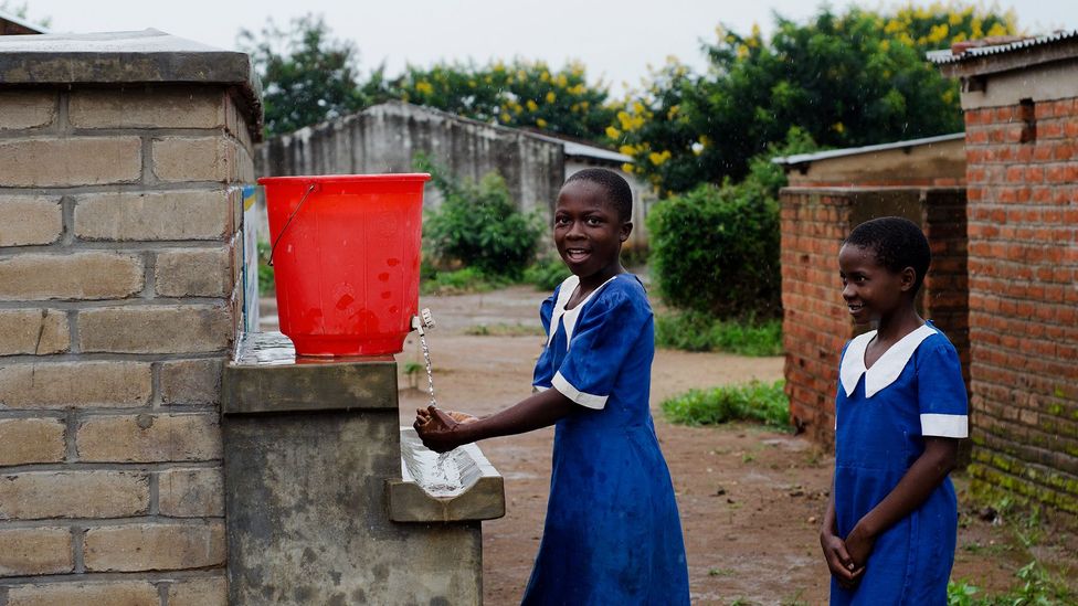 Girls wash their hands at their school’s facilities in Malawi – one example of how people’s behaviour can be changed to save lives (Credit: Getty Images) Girls wash their hands at their school’s facilities in Malawi – one example of how people’s behaviour can be changed to save lives (Credit: Getty Images)