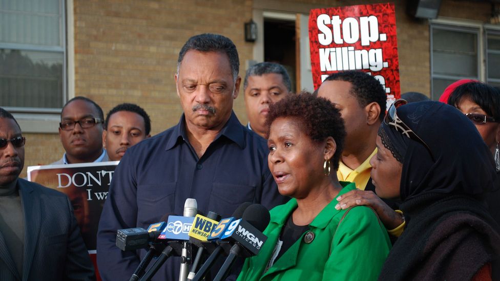 Jesse Jackson stands with Rose Braxton at a 2009 rally in South Side, Chicago; Braxton’s 16-year-old nephew was beaten to death in a brawl (Credit: Getty Images)