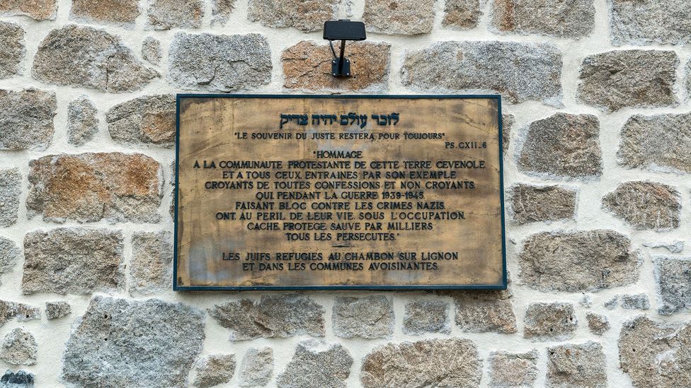 A plaque on the wall of the Temple Protestant commemorates the bravery of Chambon’s Protestant community (Credit: parkerphotography/Alamy)