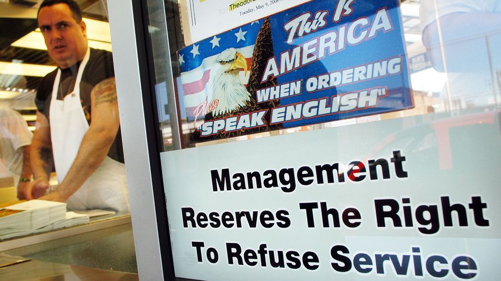 This sign hung in a Philadelphia sandwich shop in 2006, which provoked controversy - it was eventually removed from the window (Credit: Getty Images)