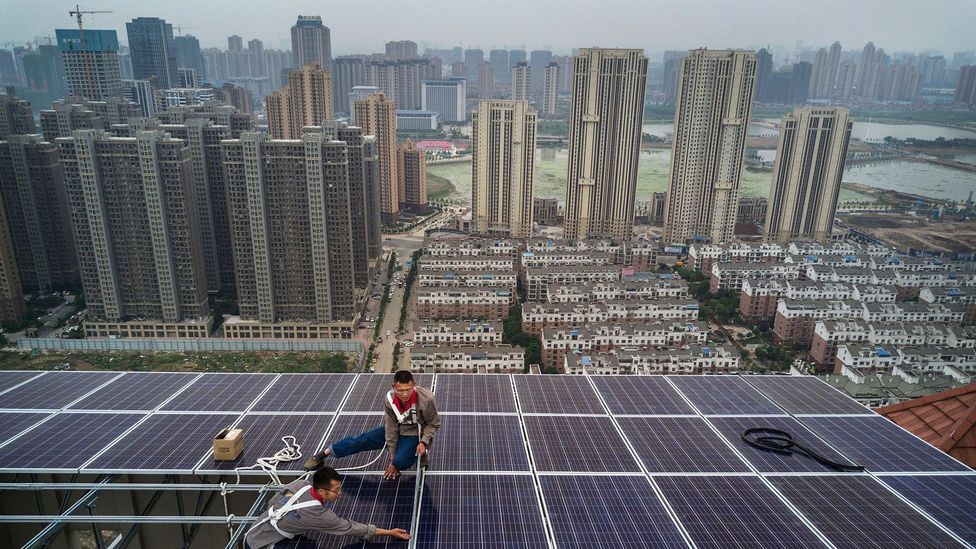 Given the inefficiency of transmitting electricity over large distances, rooftop solar panels tend to be more efficient than remote solar farms (Credit: Getty Images)
