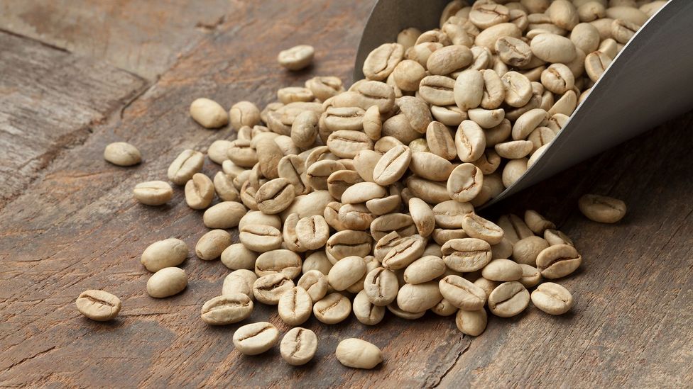 Caffeine has to be taken out of coffee beans before they are roasted (Credit: Getty Images)