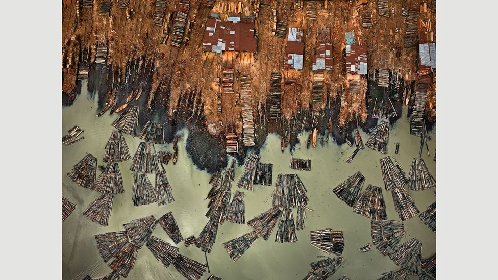 Saw Mills #1, Lagos, Nigeria, 2016 (Credit: Edward Burtynsky, courtesy Flowers Gallery, London/Metivier Gallery, Toronto) Saw Mills #1, Lagos, Nigeria, 2016 (Credit: Edward Burtynsky, courtesy Flowers Gallery, London/Metivier Gallery, Toronto)