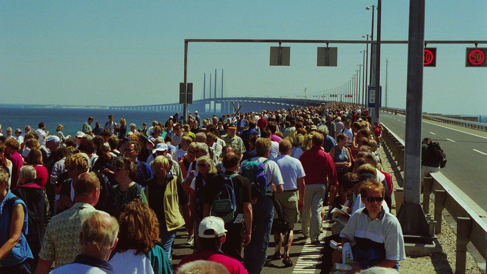 People crossing the Oresund Fixed Link Bridge at the opening in 2000 (Credit: Getty Images) People crossing the Oresund Fixed Link Bridge at the opening in 2000 (Credit: Getty Images)