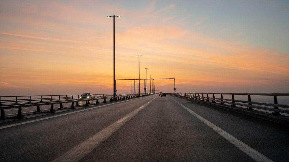 The bridge has a mass of 82,000 tonnes, is held up by two 204m-long metal pylons and stretches for 19 miles, including its underground tunnel section (Credit: Jan Søndergaard) The bridge has a mass of 82,000 tonnes, is held up by two 204m-long metal pylons and stretches for 19 miles, including its underground tunnel section (Credit: Jan Søndergaard)