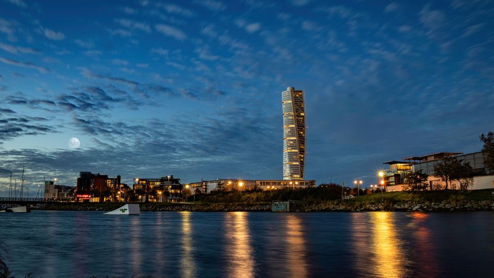 The Turning Torso tower is a 54-floor residential block that over looks the bridge it was built to symbolise Malmo's new thriving economy (Credit: Alamy) The Turning Torso tower is a 54-floor residential block that over looks the bridge it was built to symbolise Malmo's new thriving economy (Credit: Alamy)