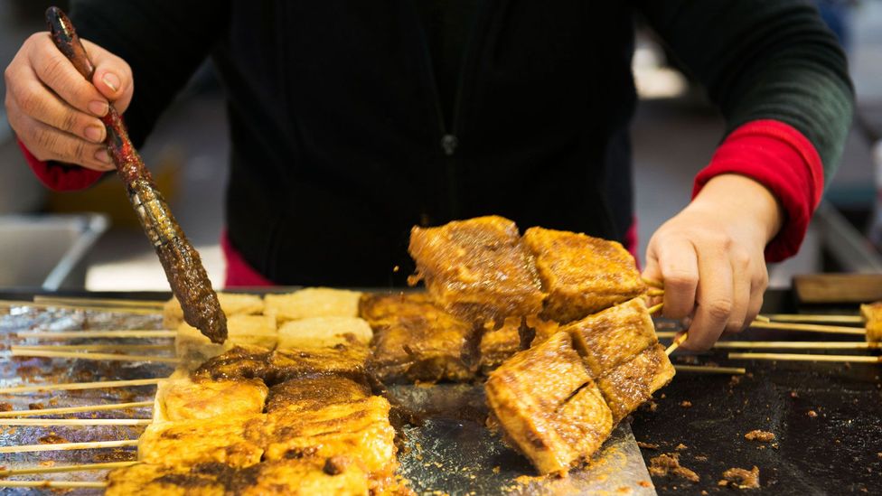 Stinky tofu is a popular option for ‘xiaoye’, or the midnight snack, in Taiwan (Credit: Boaz Rottem/Alamy)